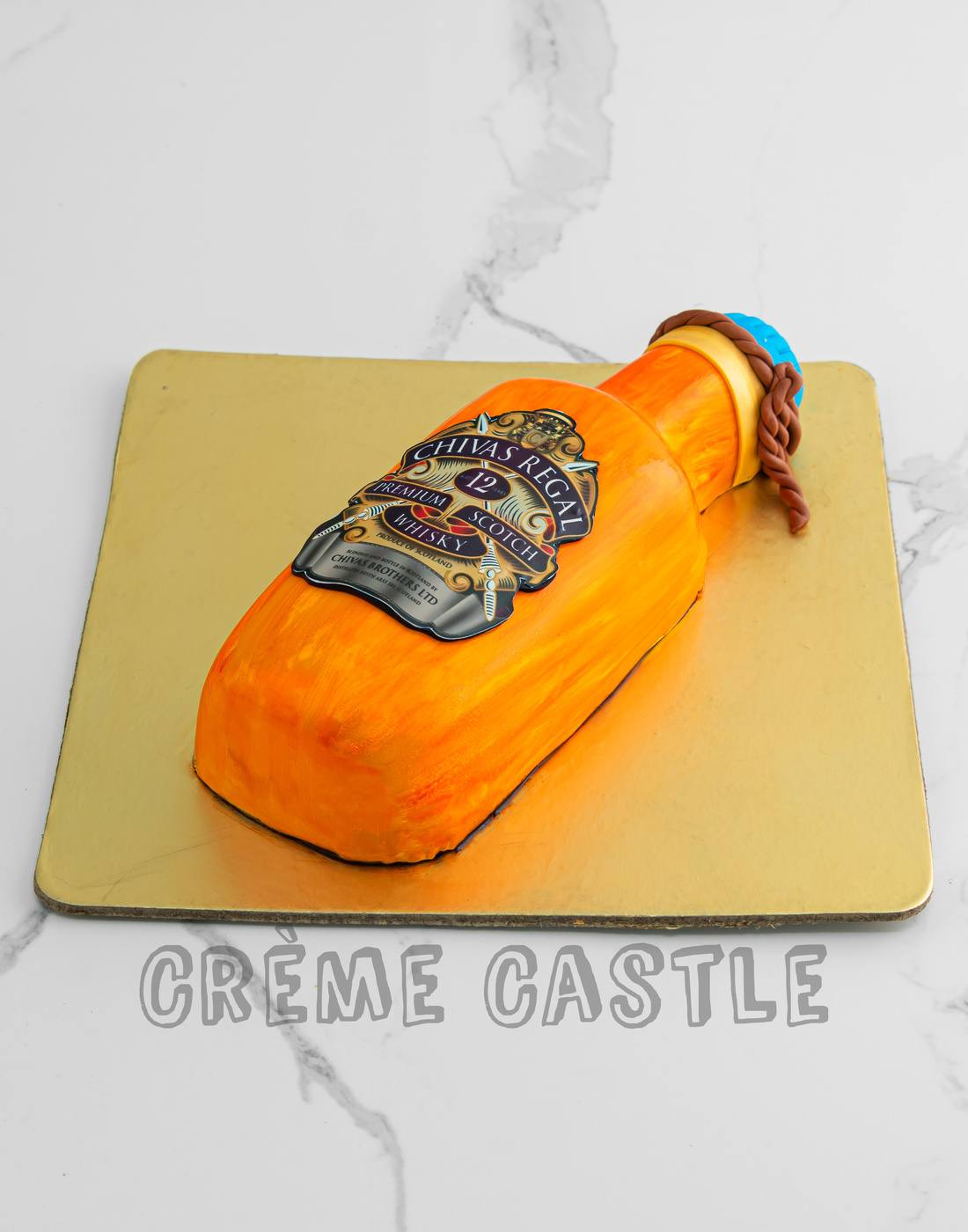 A Chivas regal bottle theme cake with hand painted bottle to give it a real  authentic look – Creme Castle