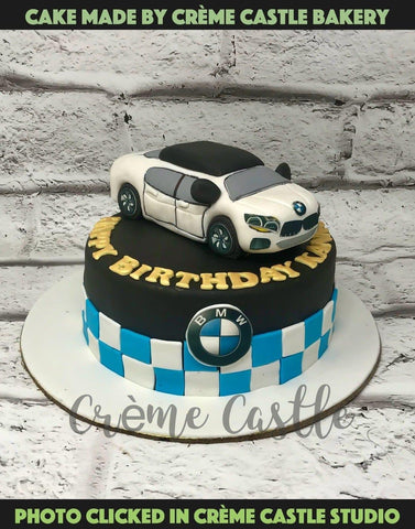 BMW theme cake with sugar paste car... - Delicious Delights | Facebook