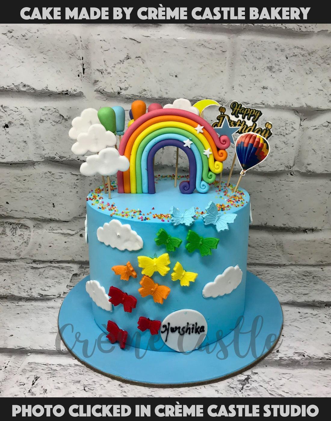 Butterflies and Rainbow Blue Cake – Creme Castle