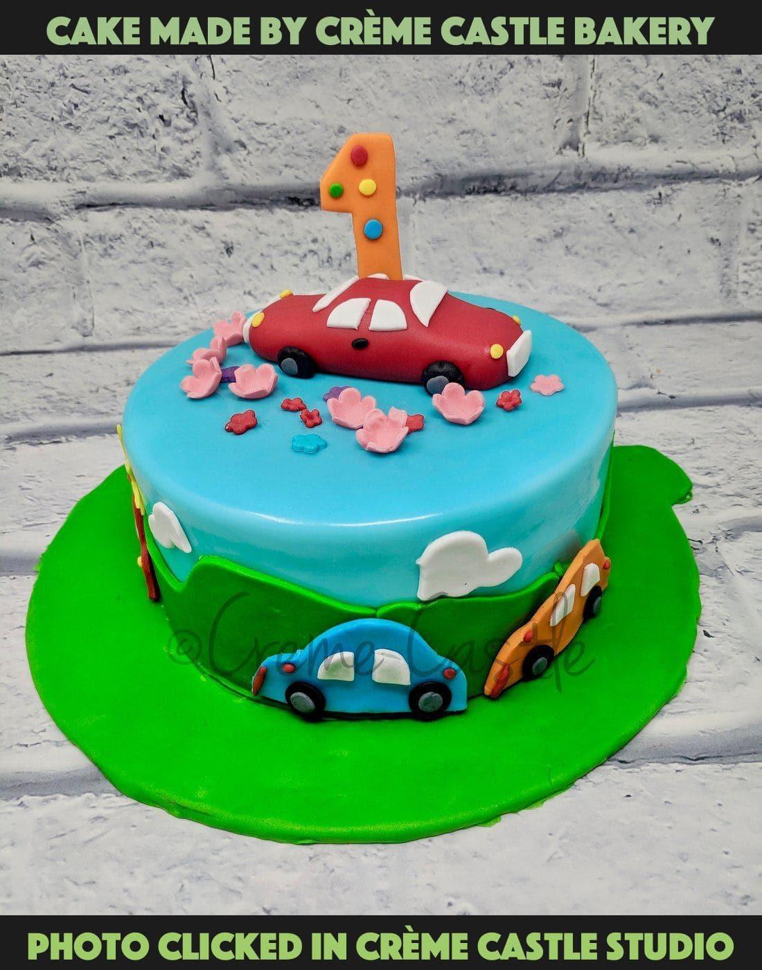First birthday car cake – Creme Castle