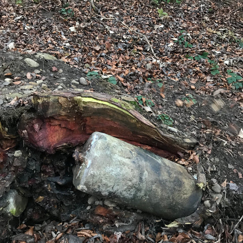 abandoned stone grass roller