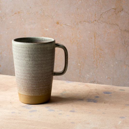 https://cdn.shopify.com/s/files/1/2130/7259/products/handmade-ceramic-16-ounce-capuccino-mug-offwhite-oat.jpg?v=1619215923&width=533