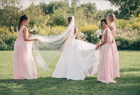 how to help the bride find her wedding gown. Pink bridesmaid dresses