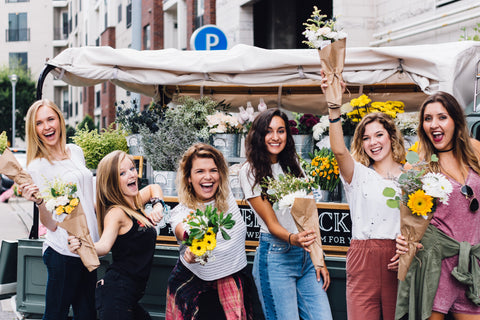 Bachelorette party survival guide: girls with sunflowers