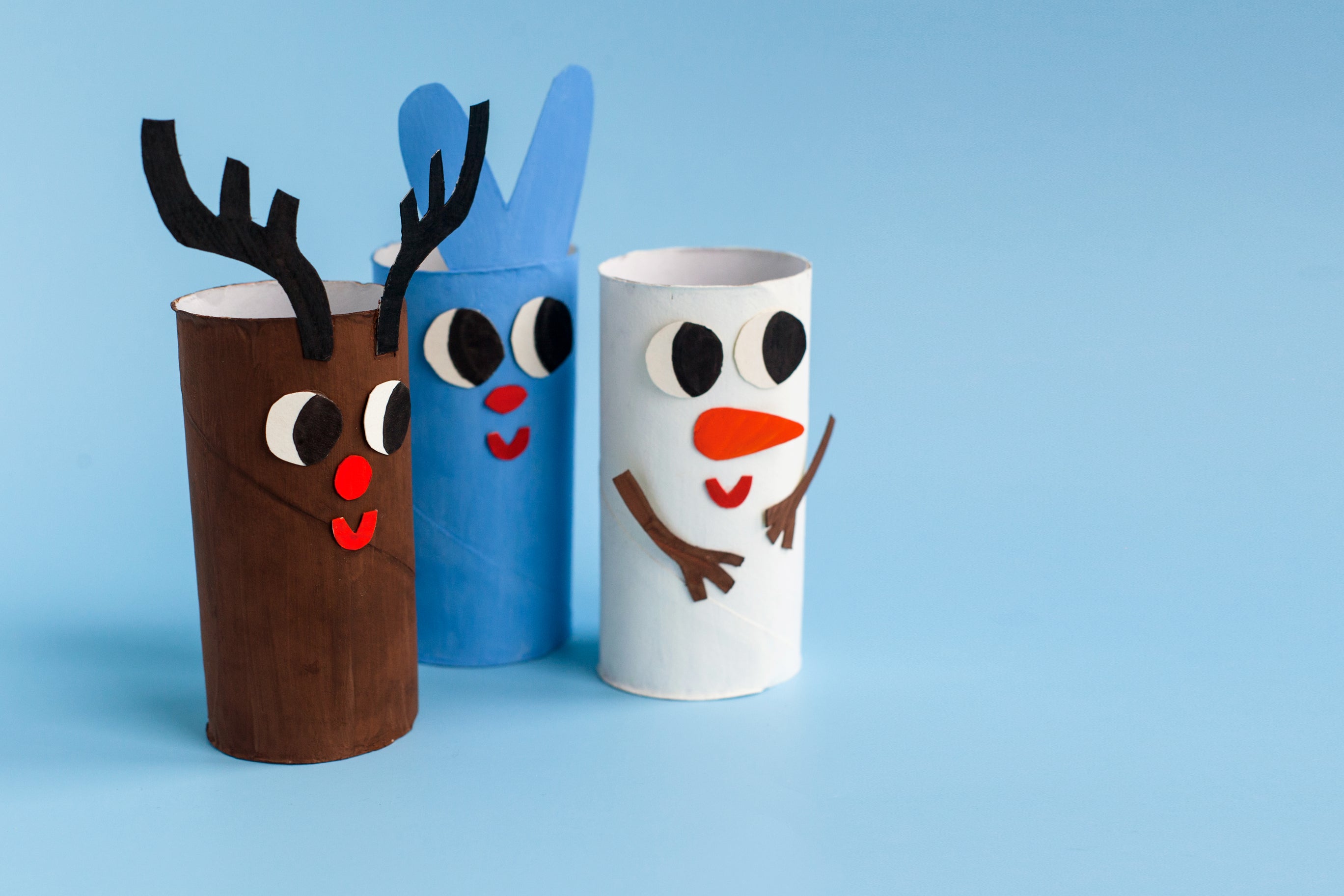 DIY paper towel or toilet roll toys for babies featuring a deer, rabbit, and snowman