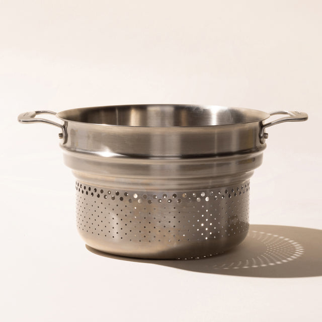 https://cdn.shopify.com/s/files/1/2131/5111/products/Web_P1_Stainless_PastaStrainer_1x1_Hero_640x640.jpg?v=1699043134
