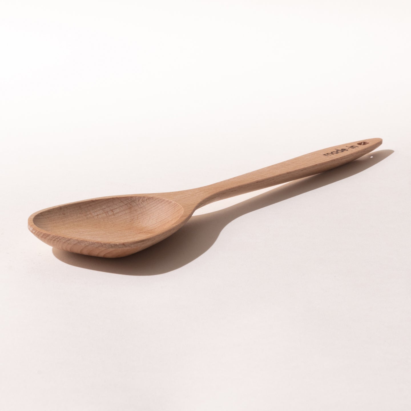 https://cdn.shopify.com/s/files/1/2131/5111/products/WoodenSpoon_PDP_Angle2.jpg?v=1690921993