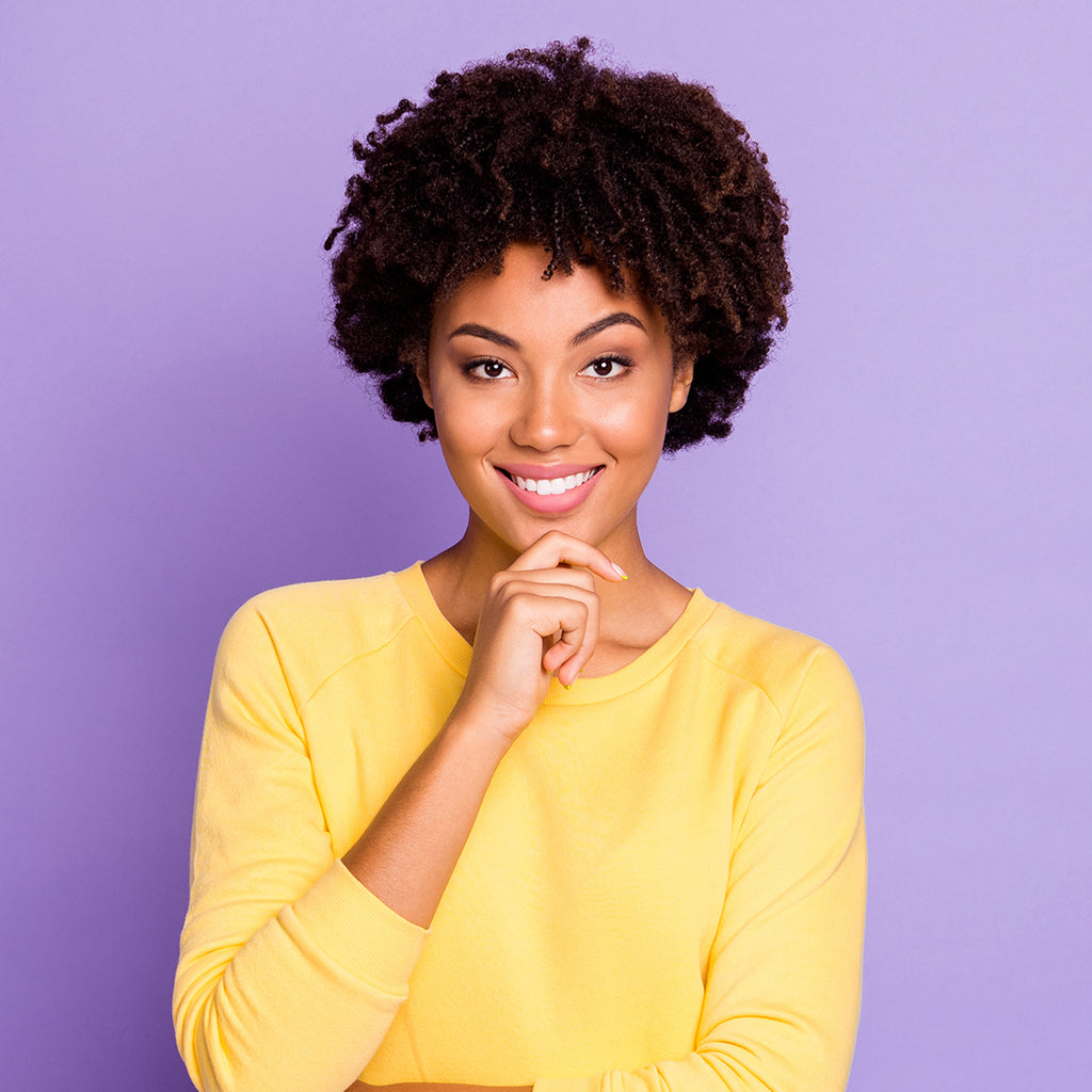 Black woman with tight curly hair