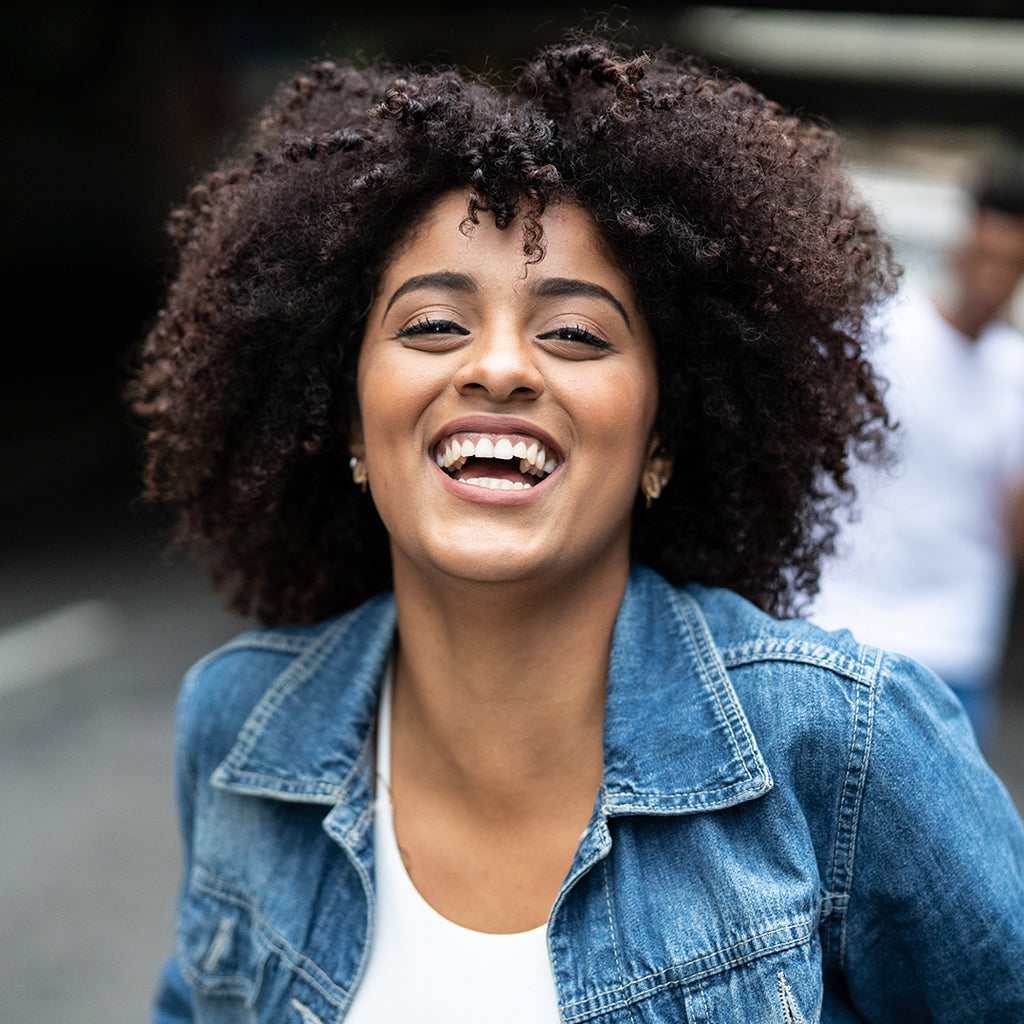 Young black woman with tight curly hair