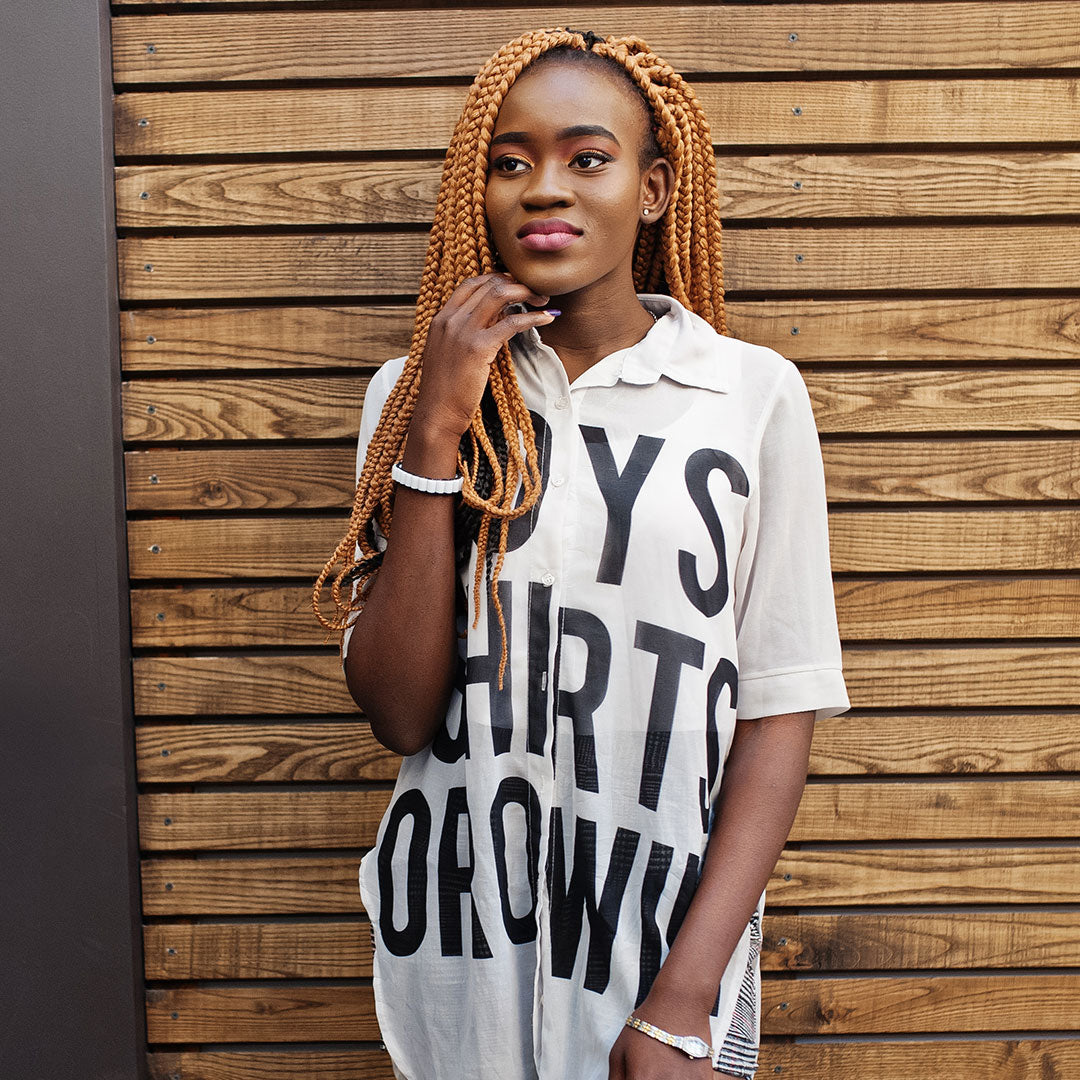 Young Black Woman Wearing Crochet Braids