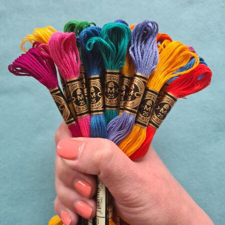A selection of colourful DMC embroidery skeins