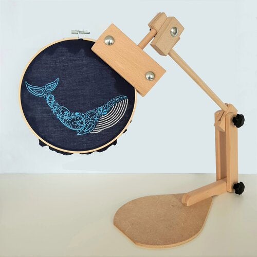 Photo of an embroidery hoop stand holding a hoop
