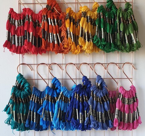 A selection of colourful DMC embroidery skeins