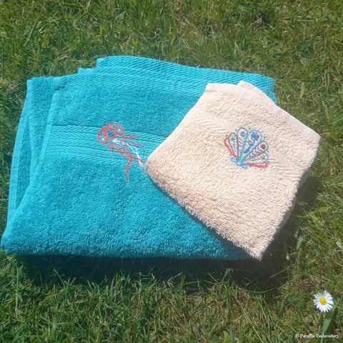 Hand embroidered seashell jellyfish towels
