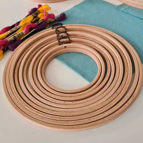 photo of multiple embroidery hoops of different sizes