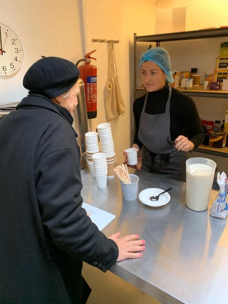 lucy working at the soup kitchen