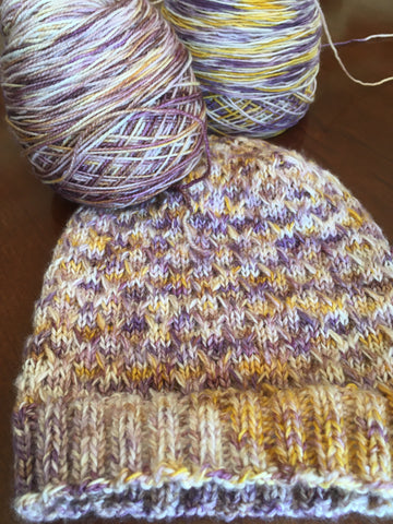Purple and yellow hat using Ice Time pattern