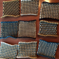nine small dishcloths in the L tweed stitch pattern