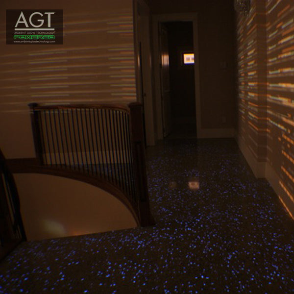Glowing polished concrete floor powered by AGT™ Sky Blue Glow Stones during the night.