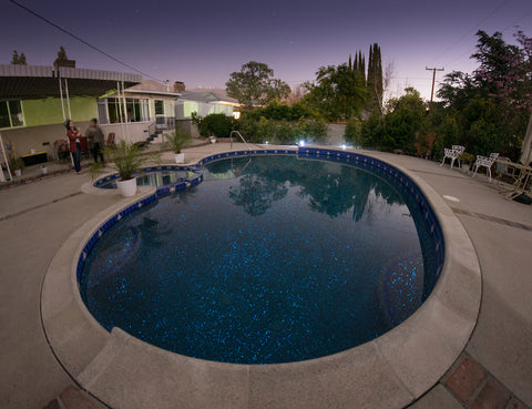 Glowing concrete pool interior using both AGT™ Ultra Grade Aqua Blue Glow Stones and AGT™ Ultra Grade Sky Blue Glow Stones.