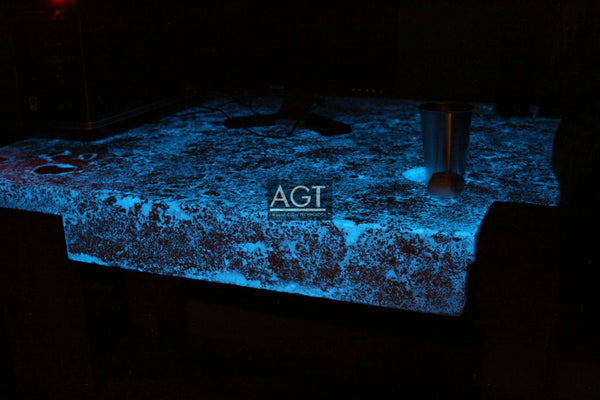 Very cool glowing work desk custom designed, powered by AGT™ Sky Blue Fine Glow Sand during the night.