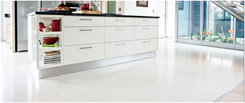White polished concrete kitchen floor powered by ½” Aqua Blue Glow Stones during the day.