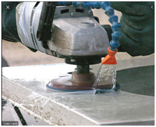 Wet Polishing the concrete using wet diamond pads.