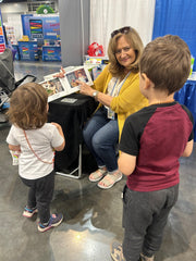 Rozanne reads to children