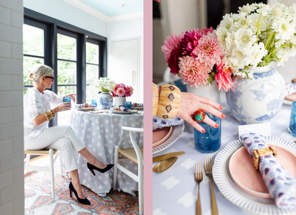 a photo of a woman sitting on a white and rattan chair at a round dining room table with sky blue patterned tablecloth styled with pink and white flowers next to close up photo of sky blue patterned tablecloth styled with pink floral napkins