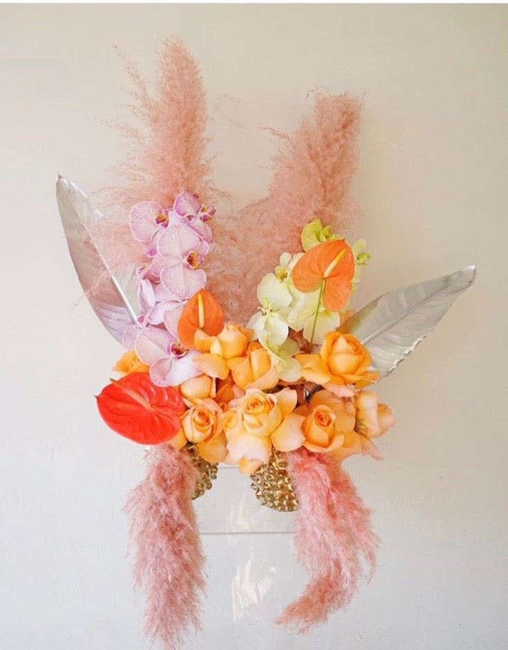 Pink, orange and peach colored whimsical bouquet