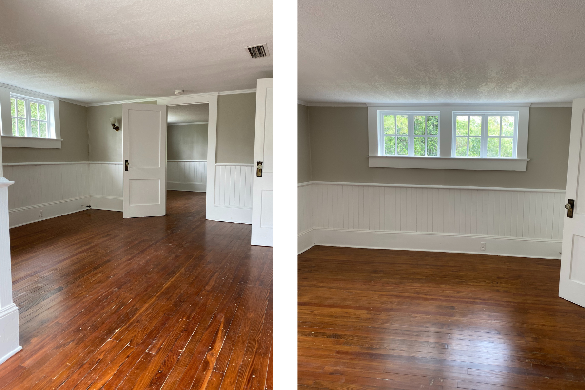 Empty room with wood floors and grey walls and white wainscoting