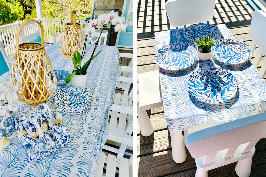 2 photos of an outdoor porch with white tables and chairs covered in sky blue botanical tablecloths and blue intricate tiger napkins