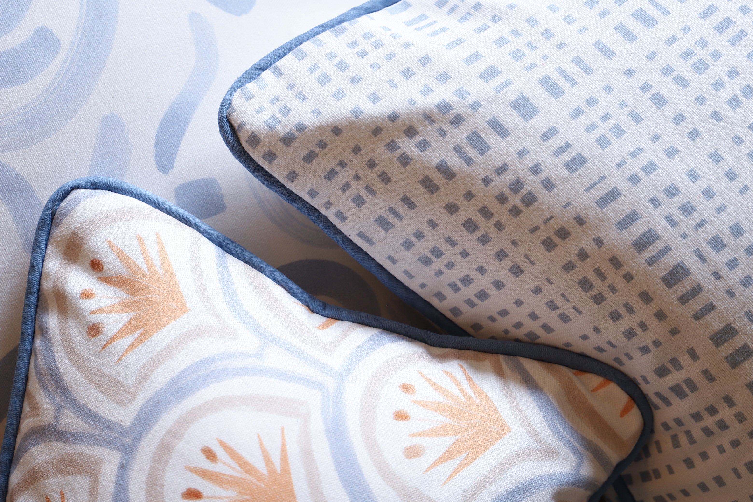 Close up of art deco pattern custom pillow, blue plaid custom pillow and abstract sky blue pillow