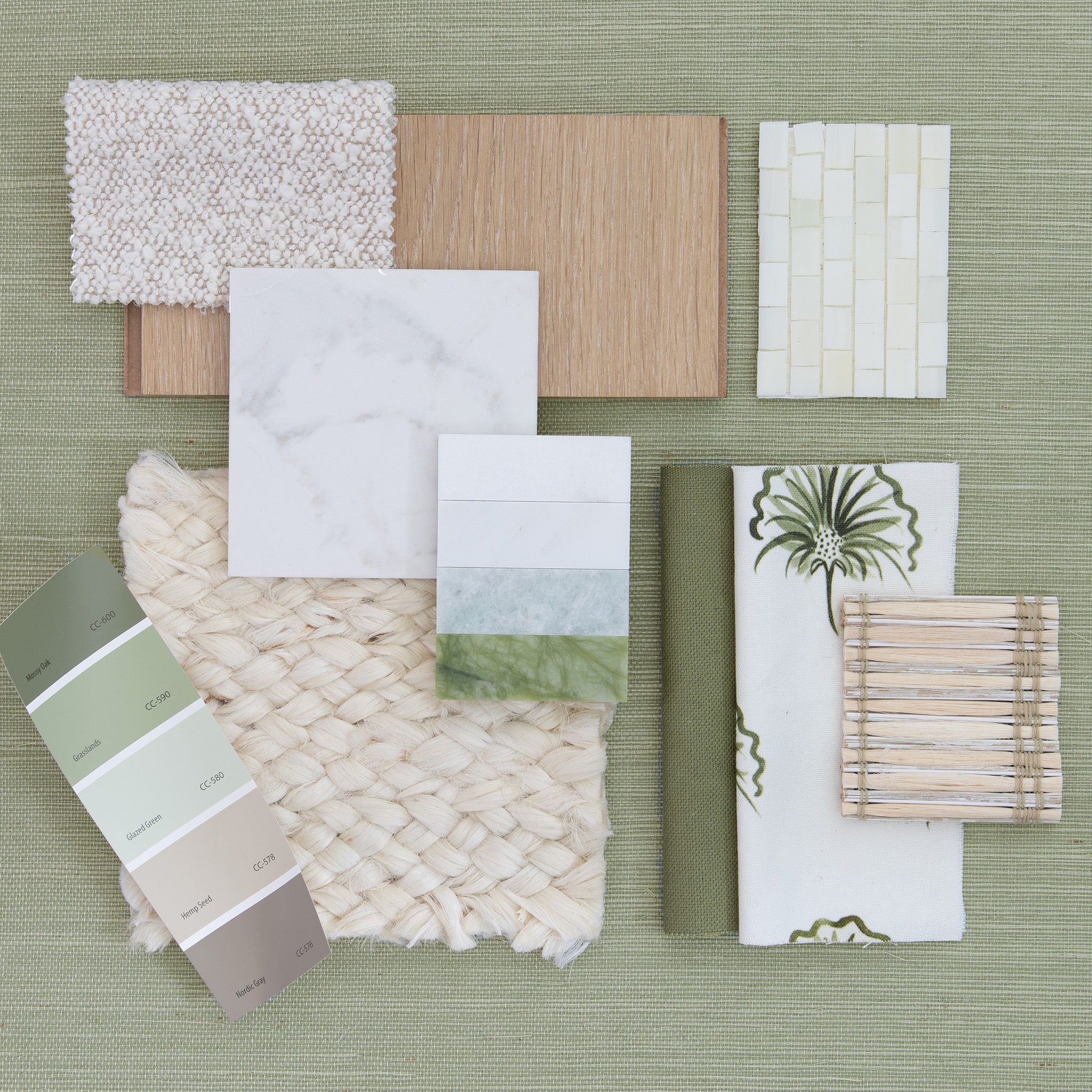 Interior design moodboard with green solid grasscloth wallpaper paired with green geometric fabric and cream accents