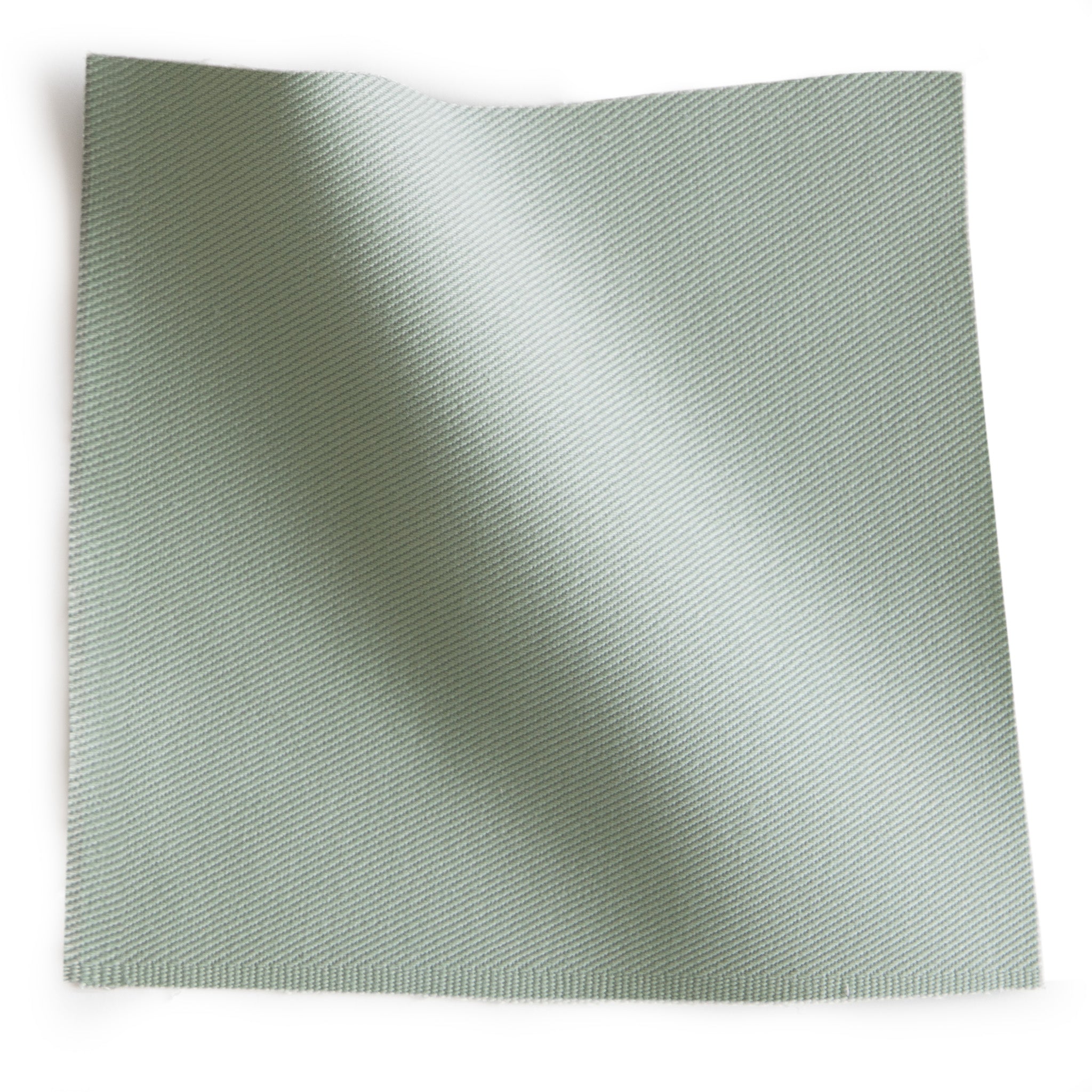 Sage green printed cotton fabric swatch