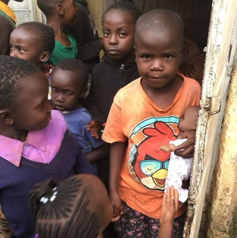 Adora donates to children in Africa