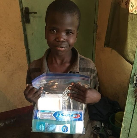 Adora donates to children in Africa