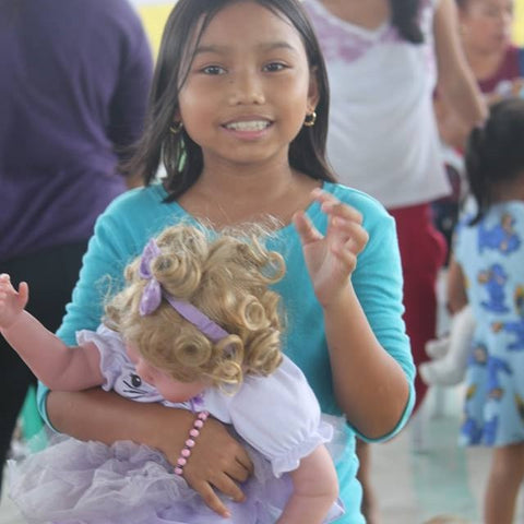 Charisma Brands donates hundreds of dolls to children in the Philippines