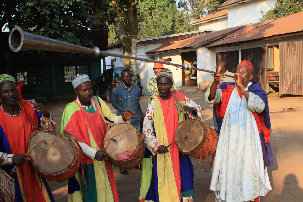 Cameroon band playing drums and horn