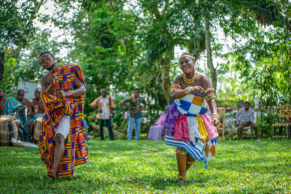 Ghana festival with people dancing in traditional clothing