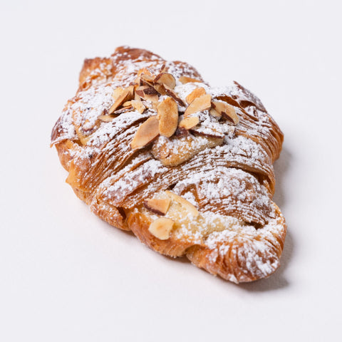 Almond croissants - Yann Haute Patisserie, authentic French pastry shop offering macarons, cakes, bread, croissants in our yellow house with parking at the back!