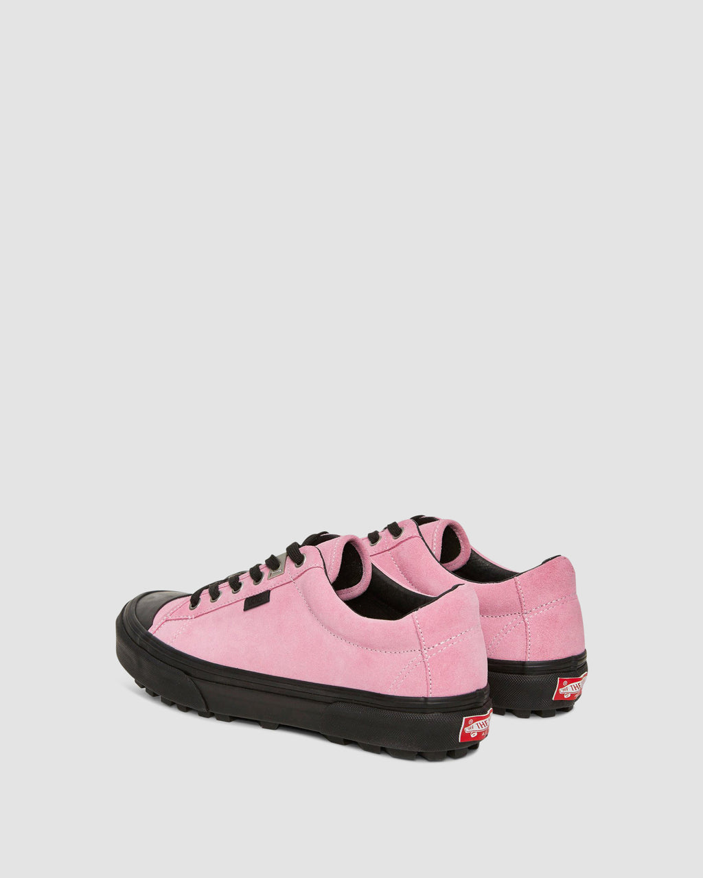 pink vans with black sole