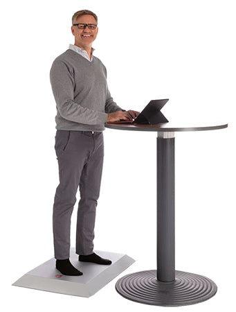 rubber-coated kybun Pyramid mat in use at standing desk