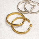 thick gold and silver hoops