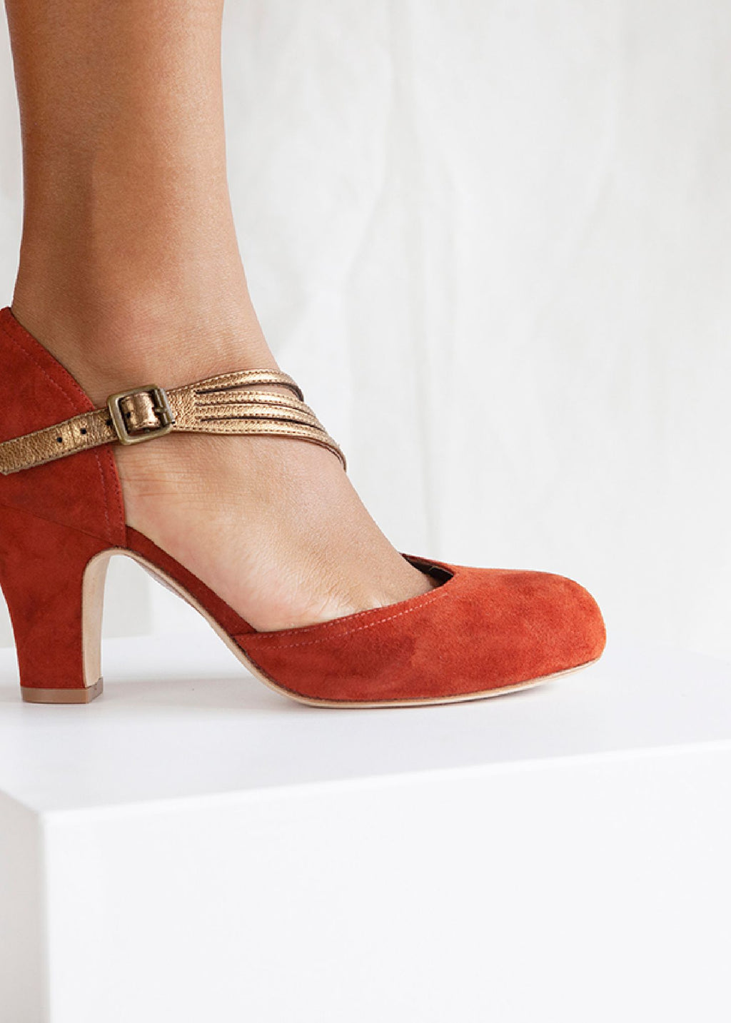rust colored suede pumps