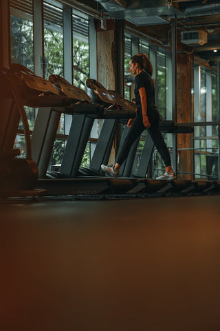 fitness center walking on treadmill