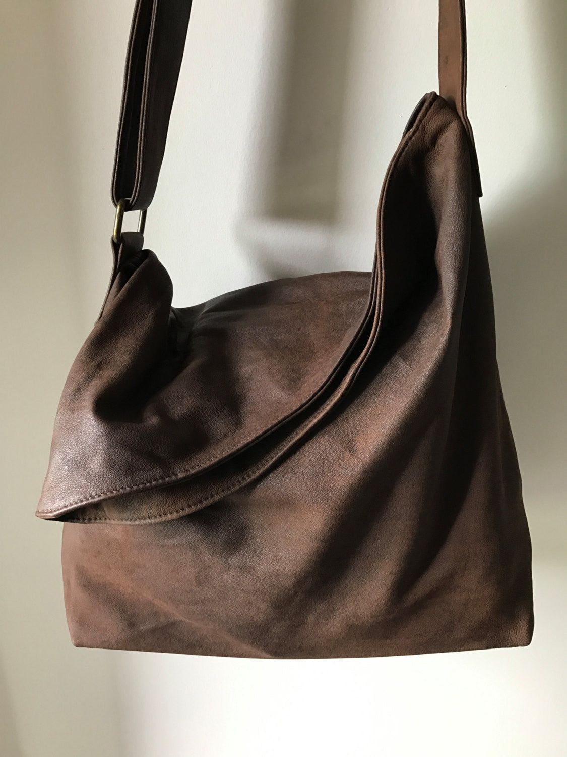 The Kadek - Folding flap over slouchy soft leather cross body bag. - Tana & Hide