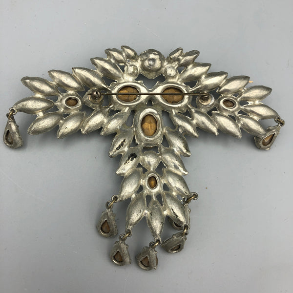 Reverse side of unmarked pot metal brooch