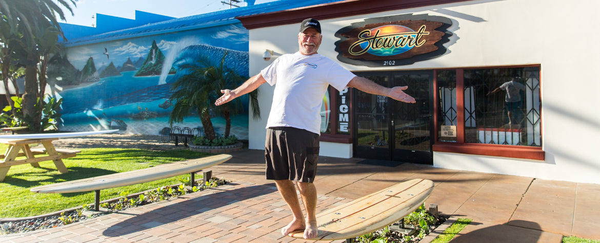 Bill Stewart in front of Stewart Surf Shop