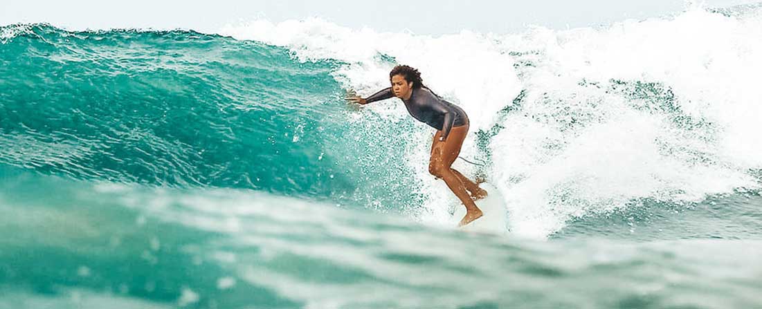 Danielle Black Lyons surfing her Stewart CMP longboard